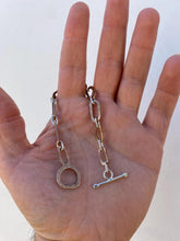 Load image into Gallery viewer, Bronze and Sterling silver chain bracelet, with abstract bronze links connected to each other with silver. this bracelet is made to order:)
